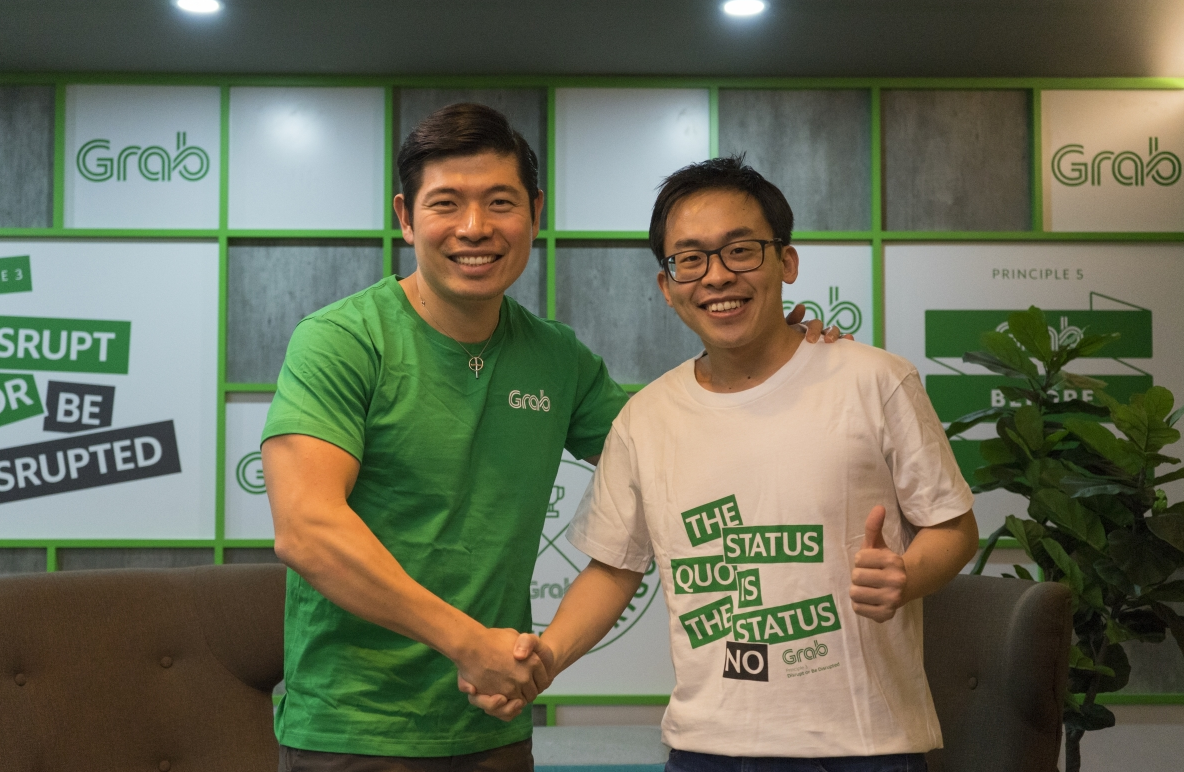 Grab CEO and co-founder Anthony Tan (left) with Albert Lucius, CEO of Kudo
