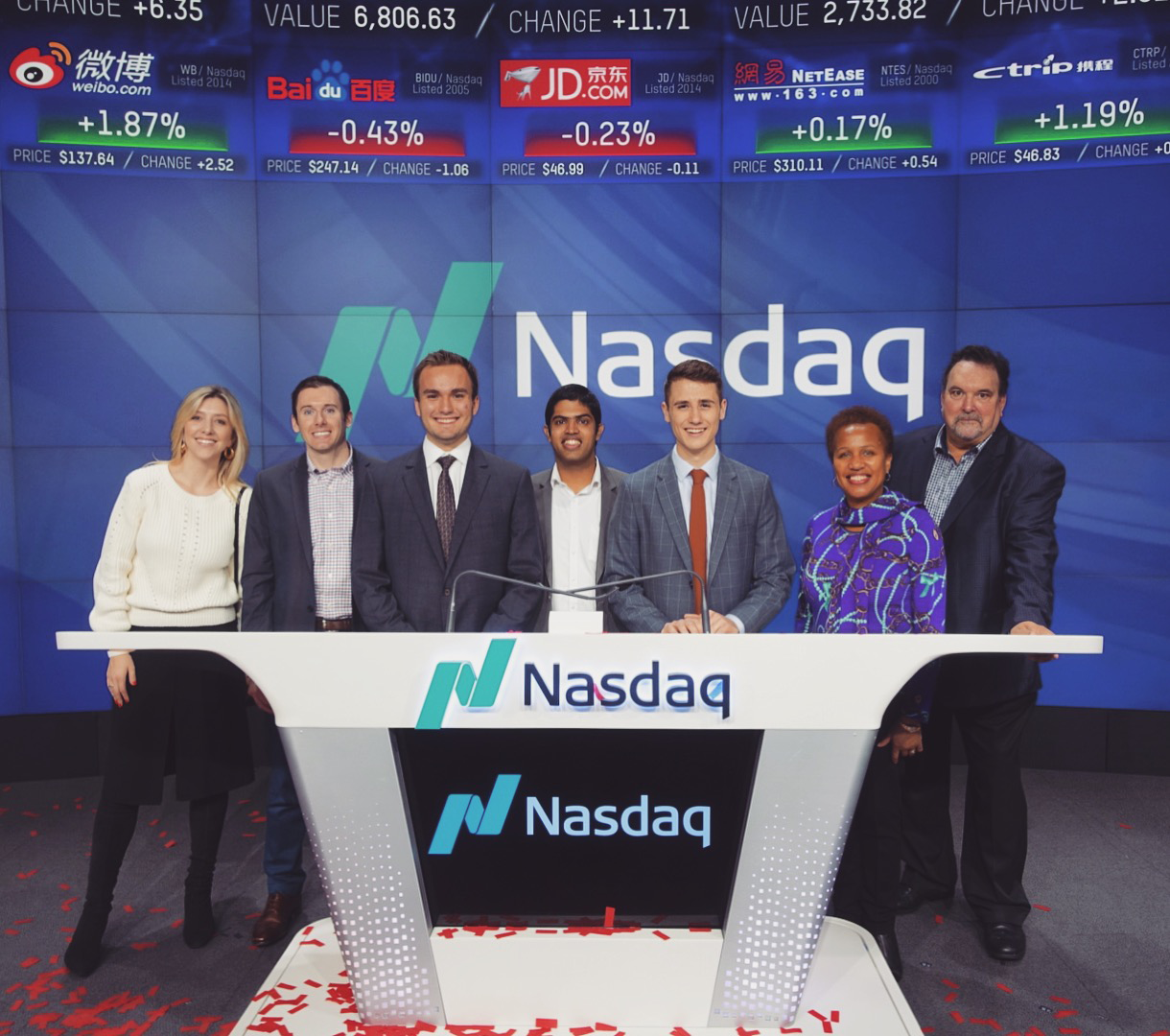 Members of the winning team from the 2017-2018 competition, the New Haven Bulldogs, at the Nasdaq with members of Voleo.